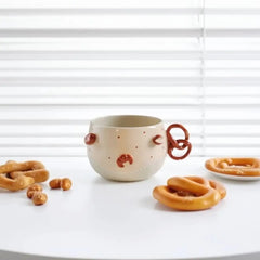 Handcrafted Pretzel Ceramic Set - Artisan Coffee Cup & Saucer, German-Inspired Drinkware